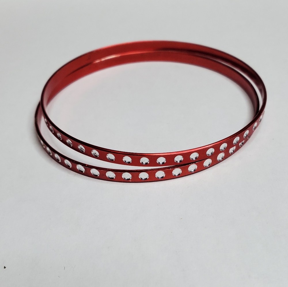 Red bangle bracelet with white dots around